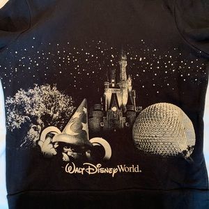 Disney Parks black zip-up hoodie in size L.